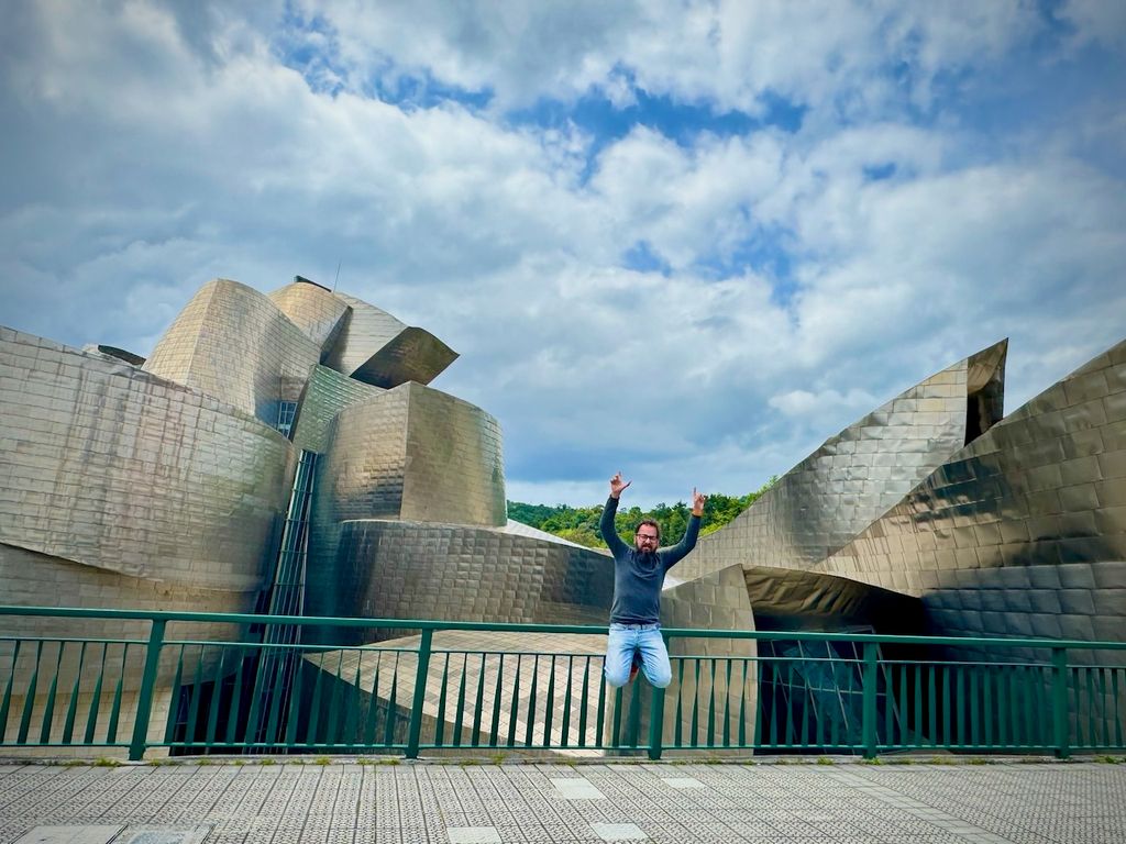 Jumping in front of the Guggenheim Museum in Bilbao